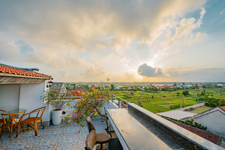 Modern pool view deluxe room at Lasanta Villa with private balcony